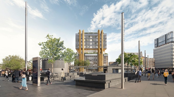 A modern building with wooden accents towers over a bustling square, surrounded by trees and busy pedestrians. Bright blue sky above.